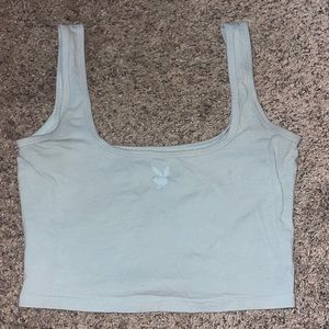 Size M, Playboy cropped tank, Color is a light green